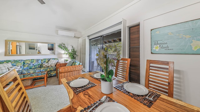 carpeted dining room featuring an AC wall unit