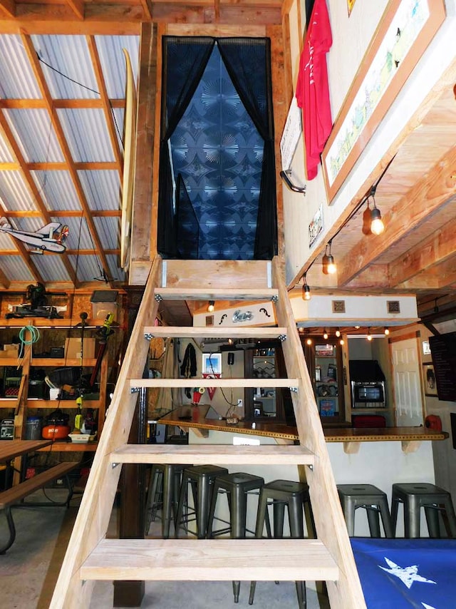 stairway featuring concrete floors