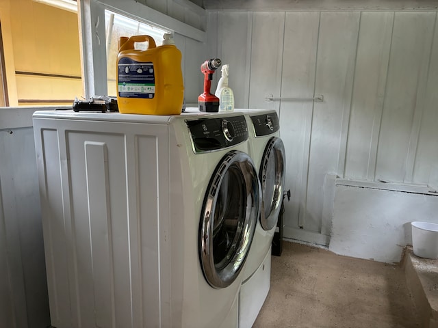 laundry area featuring cabinets