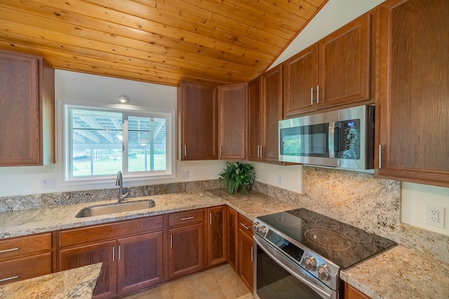 kitchen with light tile flooring, wood ceiling, appliances with stainless steel finishes, sink, and lofted ceiling