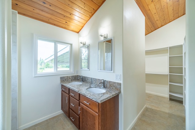 bathroom with wooden ceiling, vaulted ceiling, double sink vanity, and tile floors