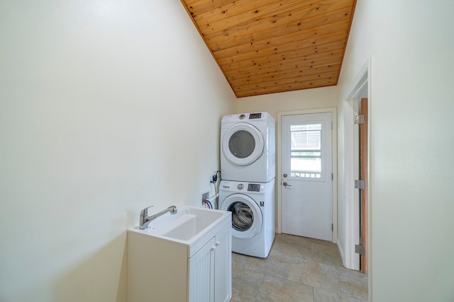 washroom featuring light tile flooring, wooden ceiling, washer hookup, sink, and stacked washer / drying machine