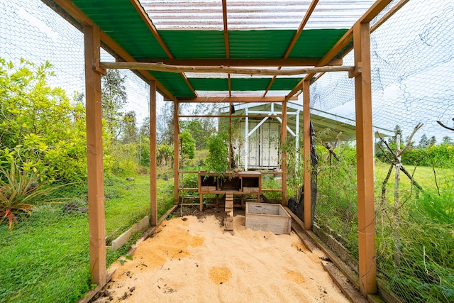 view of terrace with an outdoor structure