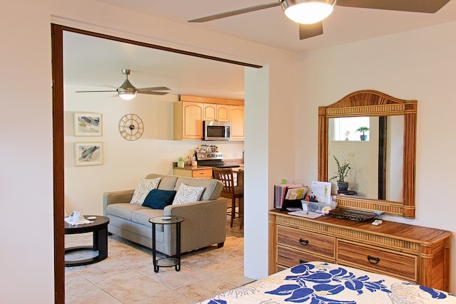 bedroom with ceiling fan and light tile patterned floors