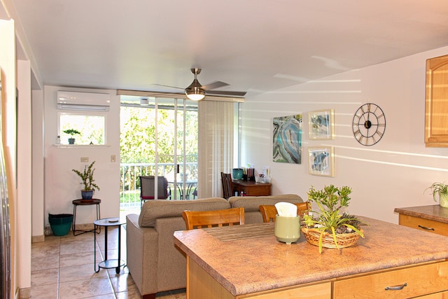 tiled living room with ceiling fan and a wall mounted AC