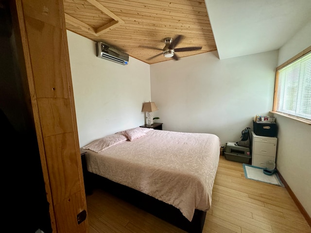 bedroom with wooden ceiling, ceiling fan, light wood-type flooring, and a wall mounted air conditioner