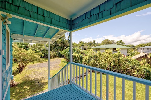 deck featuring a lawn