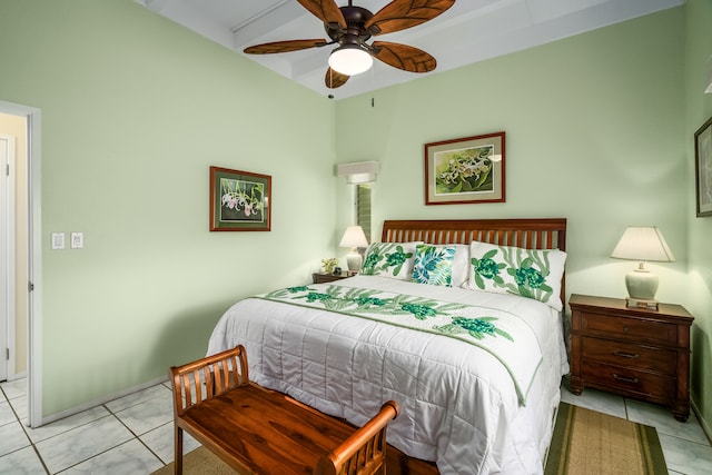 bedroom with ceiling fan and light tile floors