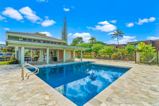 view of swimming pool featuring a patio