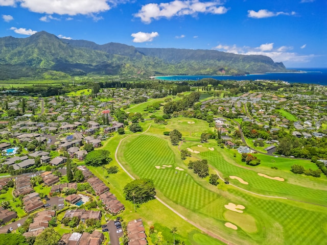 aerial view featuring a water and mountain view