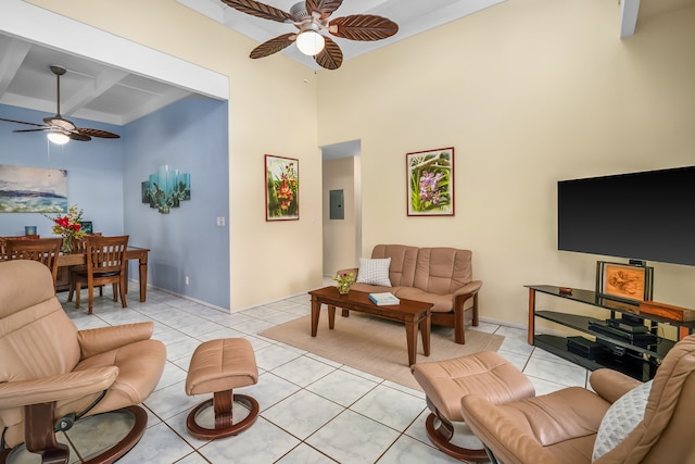 living room featuring ceiling fan, light tile flooring, and beam ceiling