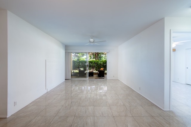 unfurnished room featuring ceiling fan