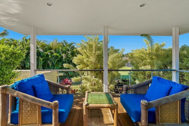 exterior space featuring an outdoor living space and a balcony