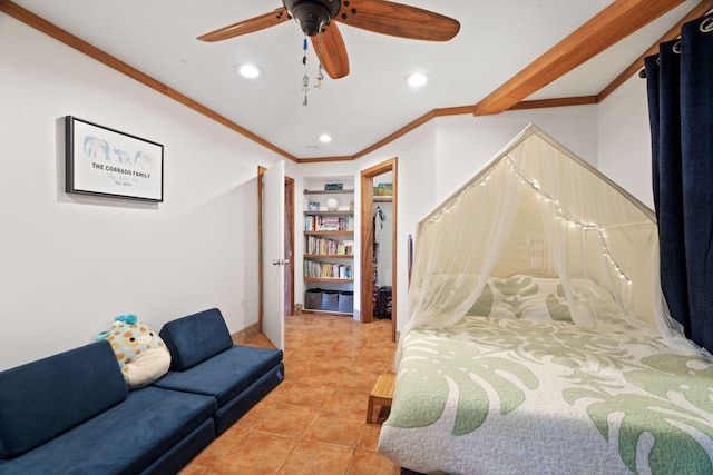 bedroom featuring ceiling fan, light tile patterned floors, and crown molding