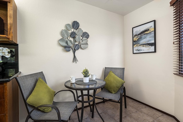 living area with light tile patterned floors