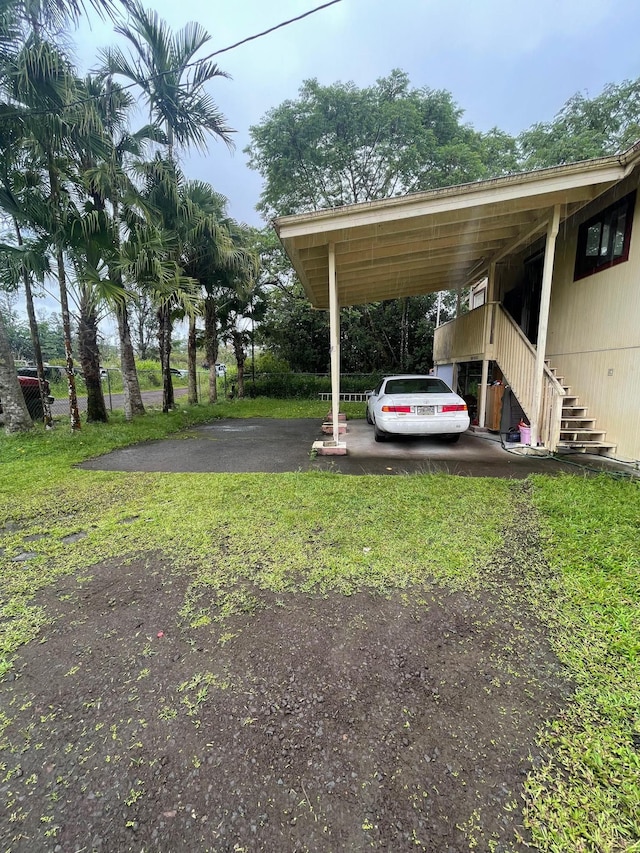 view of car parking with a carport