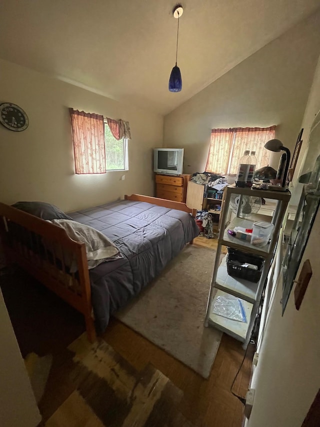 bedroom with vaulted ceiling