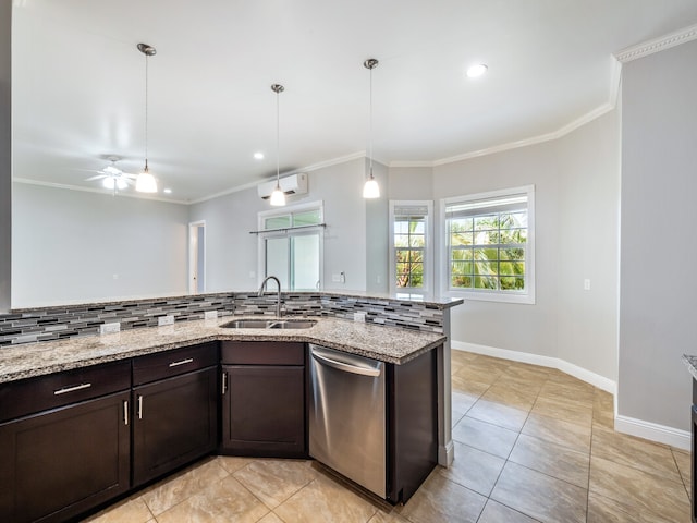 kitchen featuring decorative light fixtures, light tile flooring, tasteful backsplash, stainless steel dishwasher, and sink