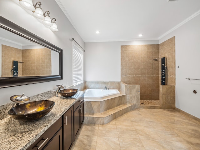 bathroom with crown molding, tile flooring, independent shower and bath, oversized vanity, and dual sinks