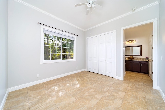 unfurnished bedroom with ceiling fan, a closet, light tile floors, ornamental molding, and connected bathroom