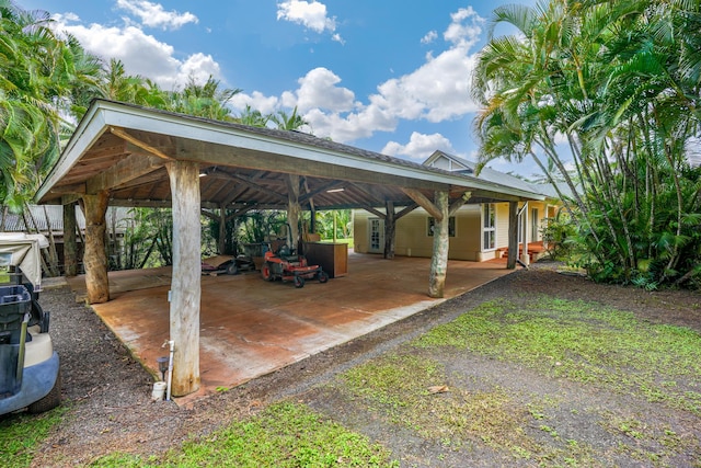 view of vehicle parking with a gazebo