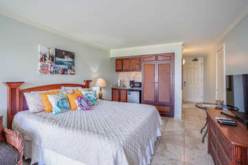 bedroom featuring light tile patterned floors and crown molding