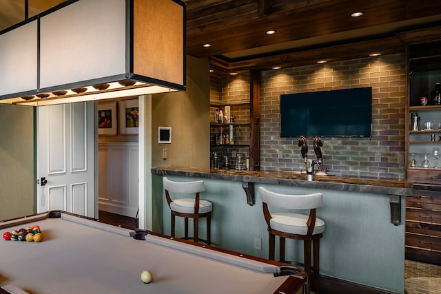 bar with tasteful backsplash and billiards