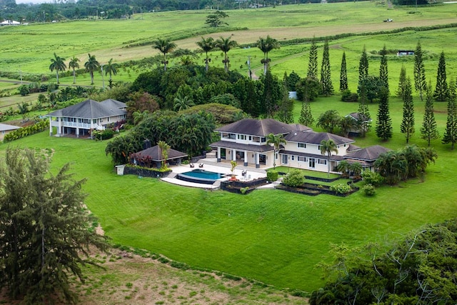 birds eye view of property featuring a rural view