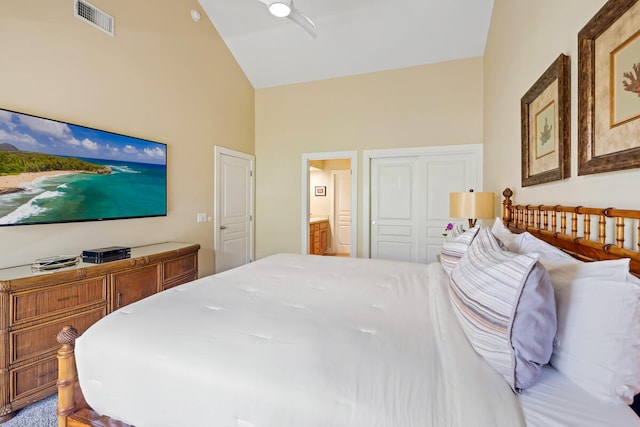 bedroom featuring carpet flooring, ceiling fan, lofted ceiling, and ensuite bath