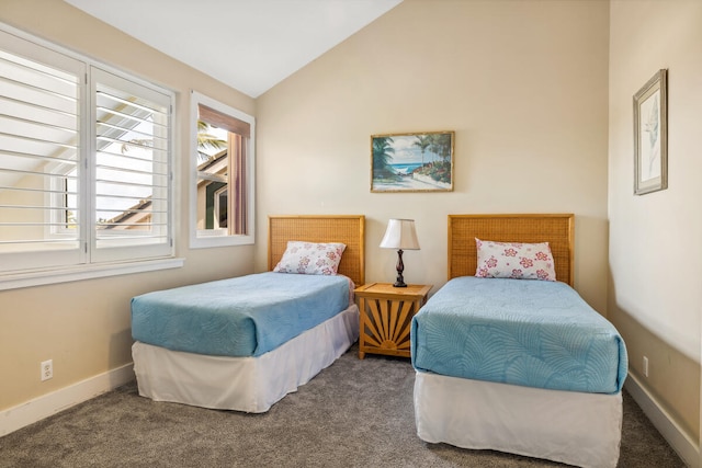 carpeted bedroom featuring vaulted ceiling