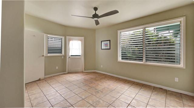 interior space featuring ceiling fan