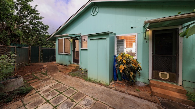 view of property exterior at dusk