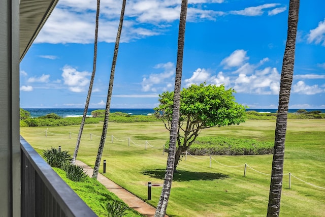 surrounding community featuring a water view