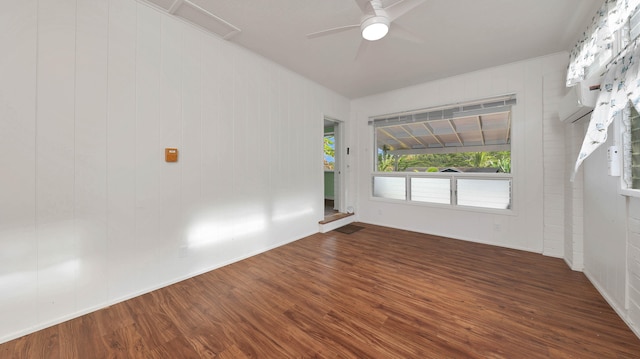 unfurnished room with dark hardwood / wood-style floors and ceiling fan