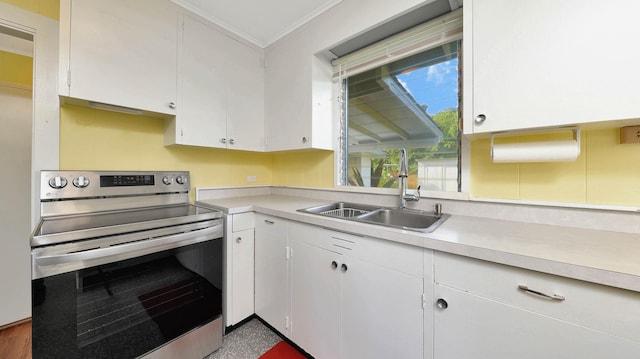 kitchen with sink, white cabinetry, ornamental molding, and stainless steel electric range