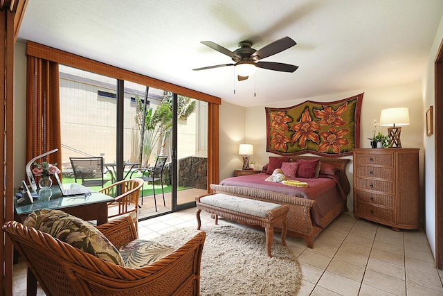 bedroom featuring light tile patterned flooring, access to exterior, and ceiling fan