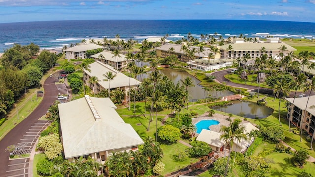 bird's eye view with a view of the beach and a water view