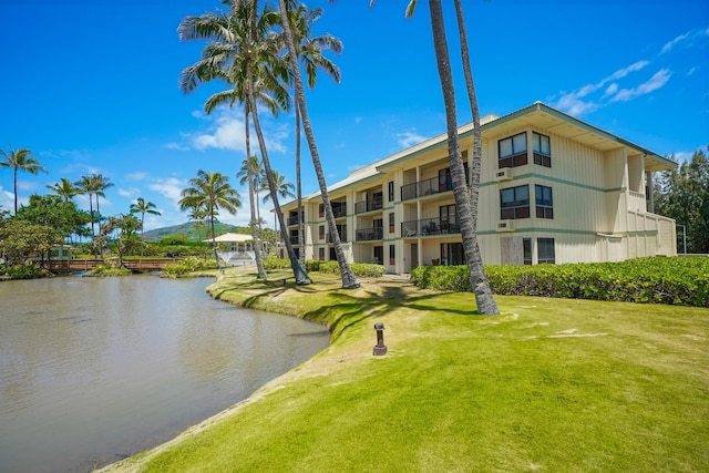 view of building exterior featuring a water view