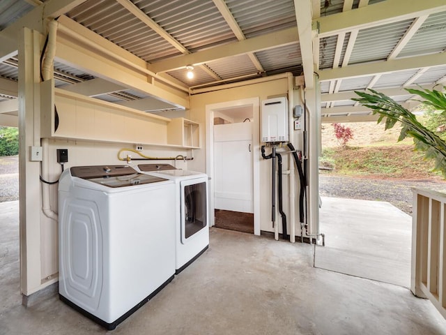 washroom with washing machine and dryer