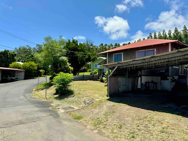 view of property exterior featuring a yard