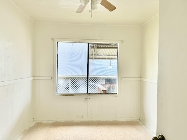 unfurnished room featuring ceiling fan