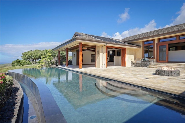 view of pool with a patio