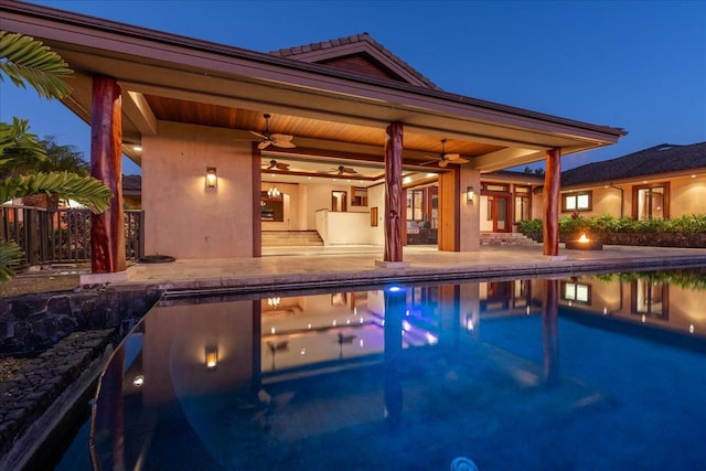 view of pool featuring a patio area and ceiling fan