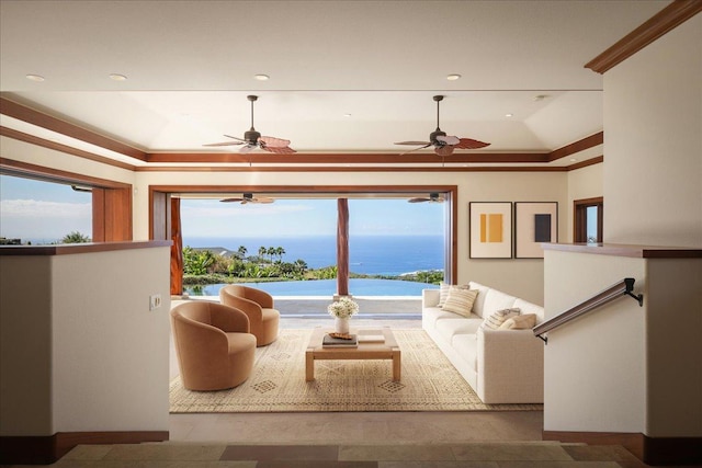 living room with crown molding, plenty of natural light, and a water view