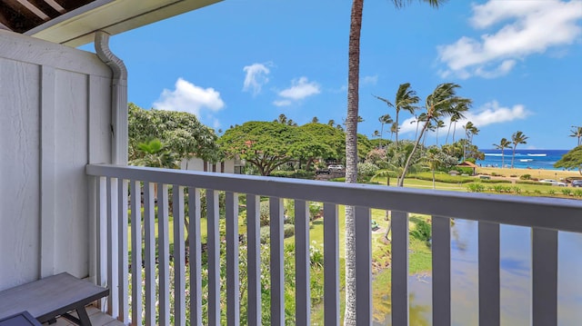 balcony featuring a water view