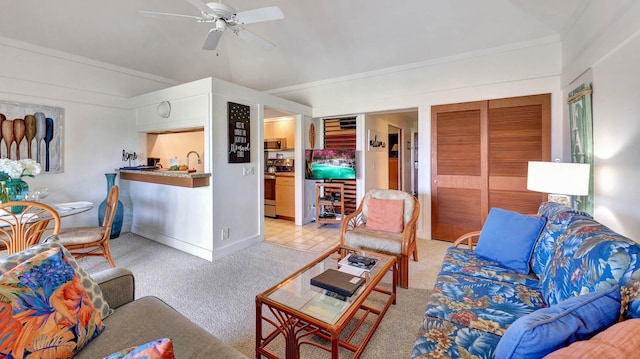 carpeted living room featuring ceiling fan