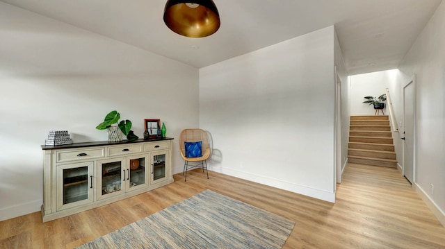 sitting room with light hardwood / wood-style flooring