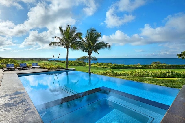 view of pool featuring a water view