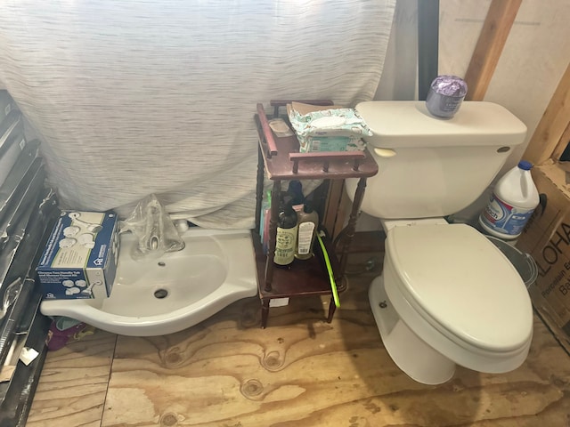 bathroom featuring toilet