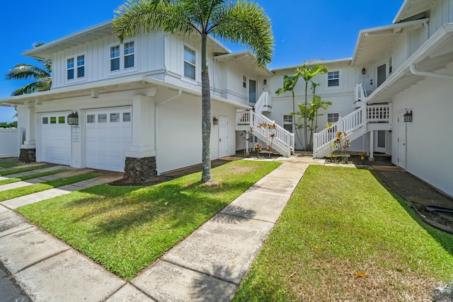 view of property's community with a yard